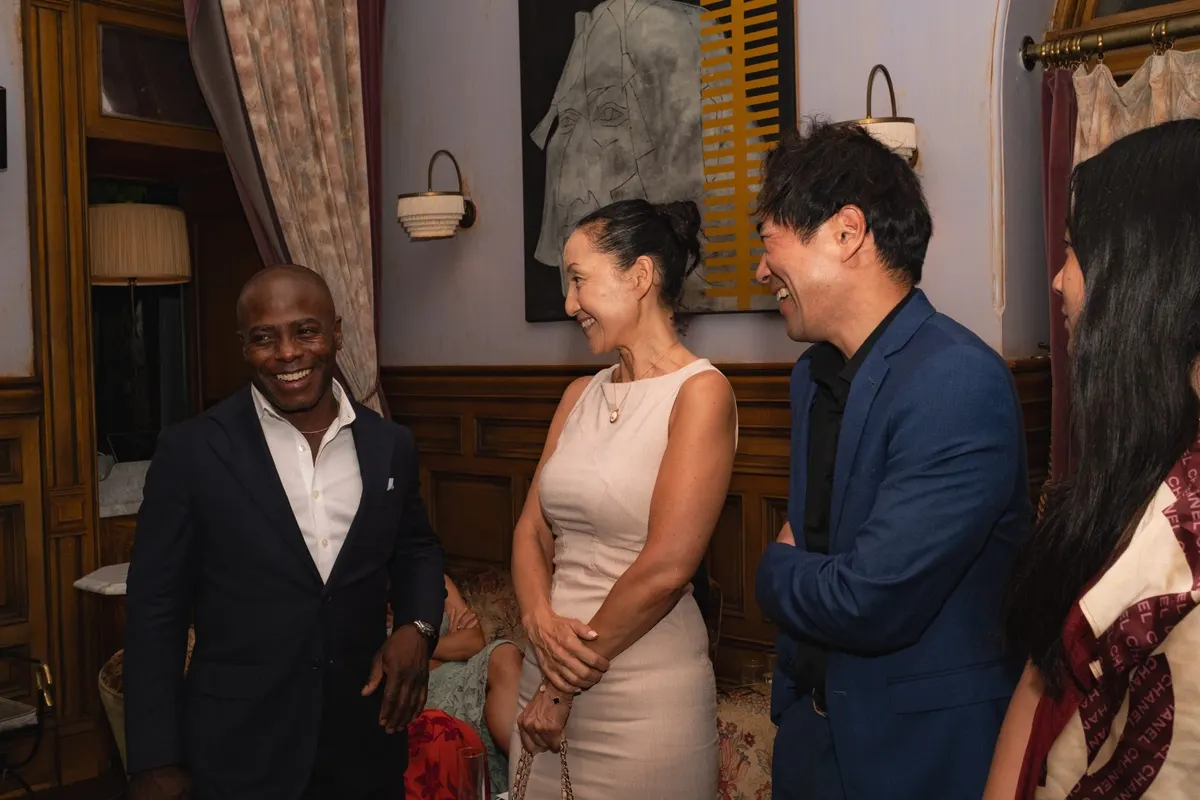 Guests and musicians talking after the concert
