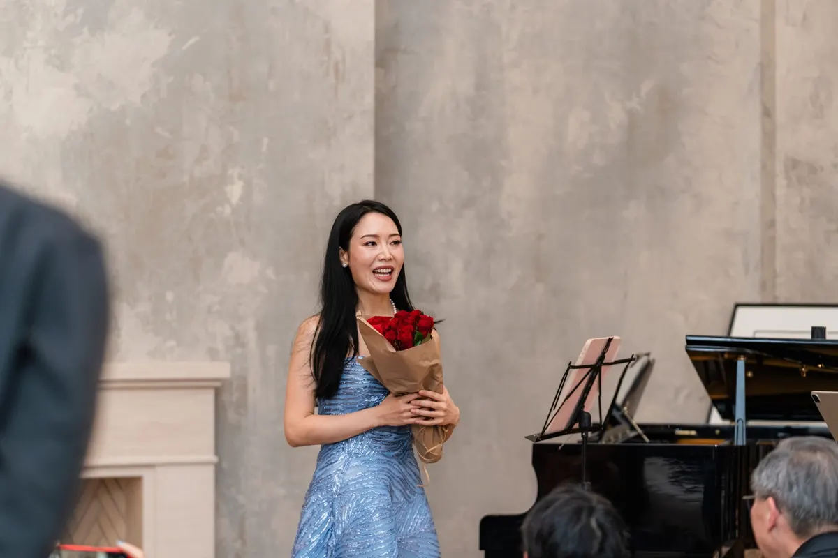 Rieko with her roses after the music