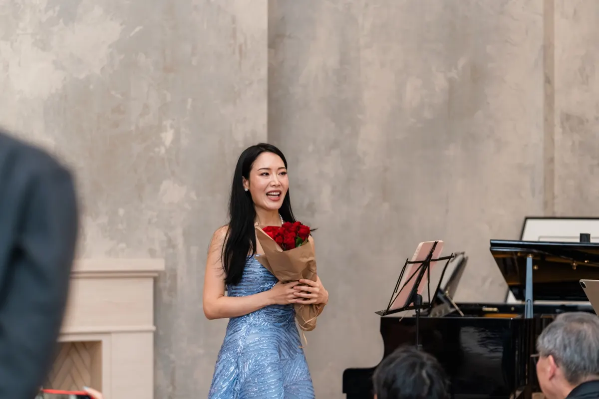 Rieko Tsuchida with roses after the bows